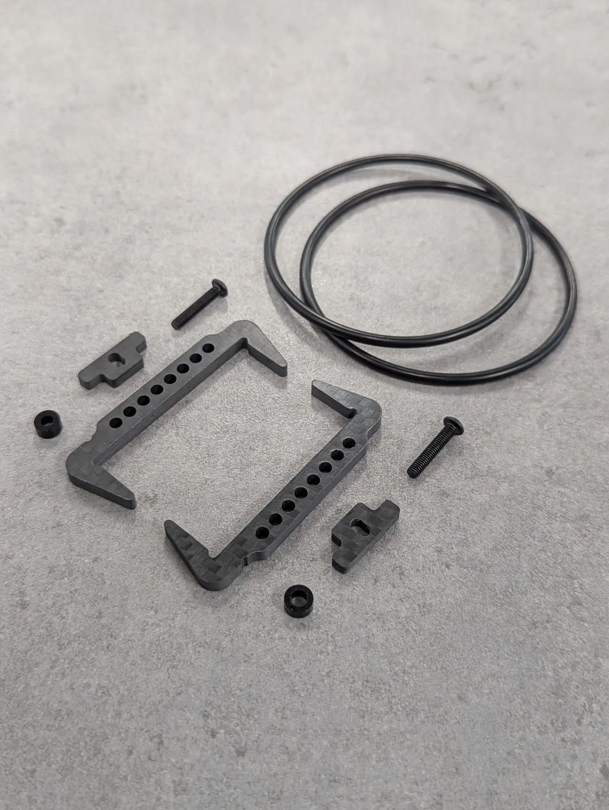 Xb2 - Xray Xb2 Carbon O Ring Battery Mount 1