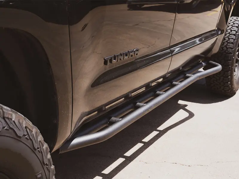 Cali Raised Trail Edition Rock Sliders For 2014–2021 Toyota Tundra — Kick-Out Design, Raw Finish 1
